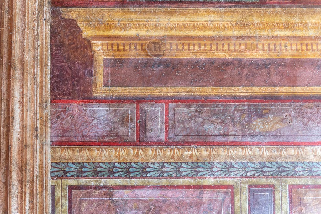 Villa of Mysteries, Pompeii. October 2023. Room 8, detail from south end of upper east wall. Photo courtesy of Johannes Eber.
