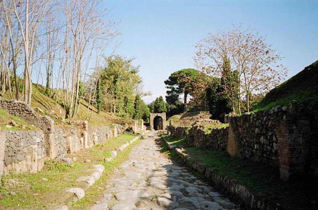 Via di Nola. Looking east to the crossroads from near IV.3.e. October 2009. Photo courtesy of Rick Bauer.