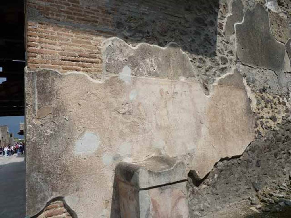 Unnamed vicolo, east side, May 2010. Street altar on corner of I.11.1 with Via dell’Abbondanza.