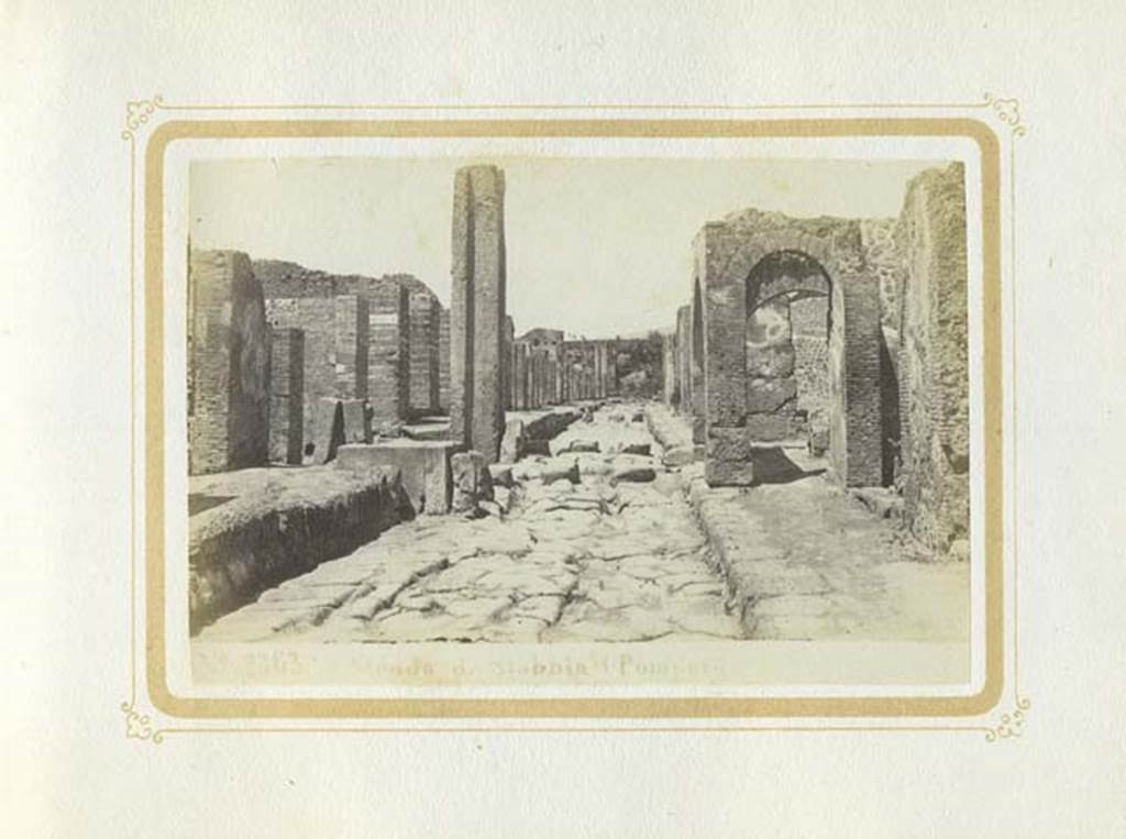 Via Stabiana, Pompeii. Album dated January 1875. Looking north between VII.1 and IX.2, towards junction with Via degli Augustali. Photo courtesy of Rick Bauer.
