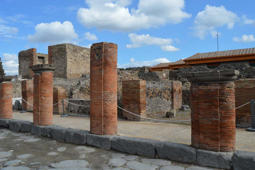 Via del Foro, east side, Pompeii. March 2018. 
Looking north-east towards sixth (on right), seventh, eighth and ninth bases/pilaster/columns.
Foto Taylor Lauritsen, ERC Grant 681269 D�COR.
