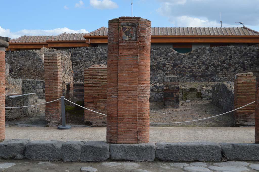 Via del Foro, east side, Pompeii. March 2018. 
Looking east to seventh pilaster/column from south end, outside VII.4.6, at rear, behind portico.
Foto Taylor Lauritsen, ERC Grant 681269 D�COR.

