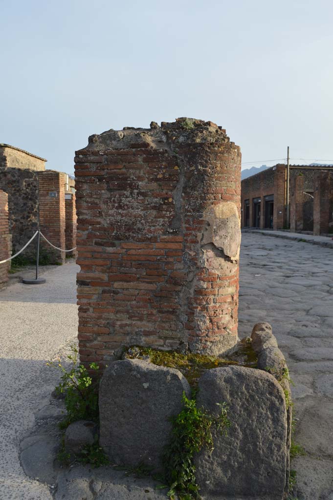Via del Foro, east side, Pompeii. March 2019. Looking south at north end pilaster/column base. 
Foto Taylor Lauritsen, ERC Grant 681269 D�COR.
