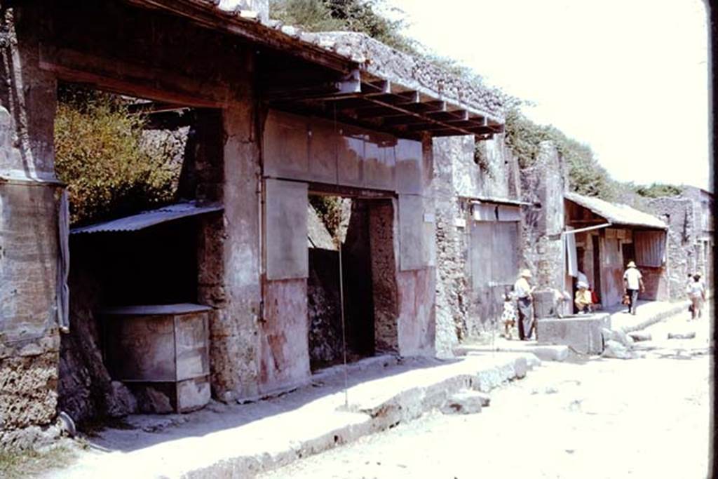 Via dell’Abbondanza, north side, Pompeii. 1961. Looking east from near  IX.7.2.  Photo by Stanley A. Jashemski.
Source: The Wilhelmina and Stanley A. Jashemski archive in the University of Maryland Library, Special Collections (See collection page) and made available under the Creative Commons Attribution-Non Commercial License v.4. See Licence and use details.
J61f0713
