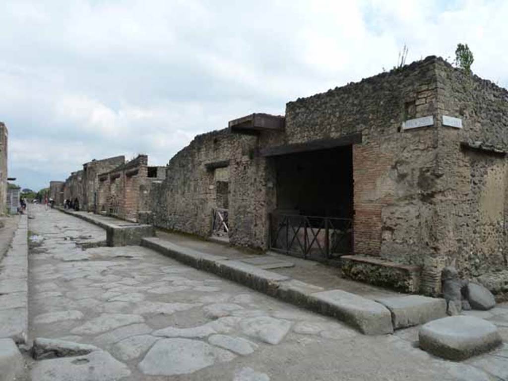 Via dell’Abbondanza, south side. May 2010. Looking east along II.1 from junction with Via di Nocera.
