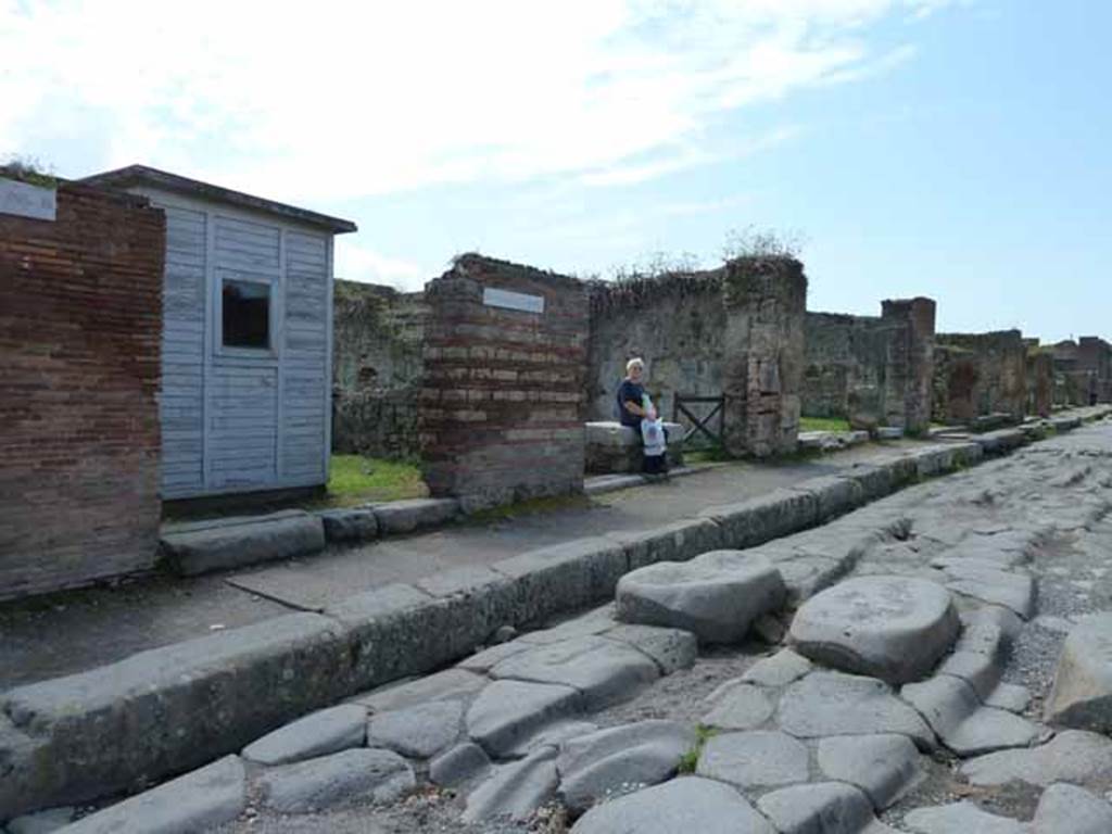 Via della Fortuna, south side. May 2010. Looking west from VII.3.14. at junction with crossroads. 
