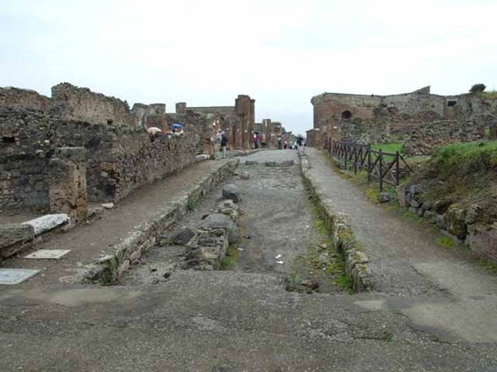 Via delle Terme. May 2010. Looking east between VI.4 and VII.6.