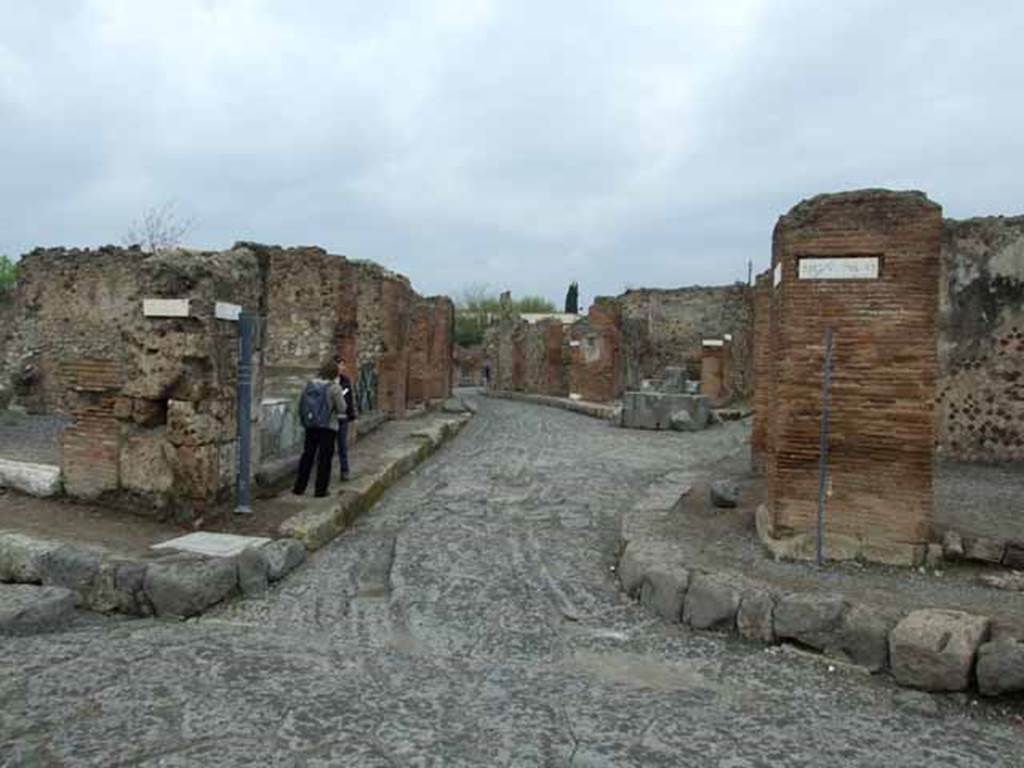 Via delle Terme.  May 2010.  Looking north between VI.4 and VI.6.