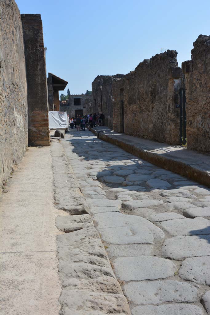 Vicolo del Menandro, April 2017. Looking east along south side, from near I.4.28, on left. 
Photo courtesy Adrian Hielscher.
