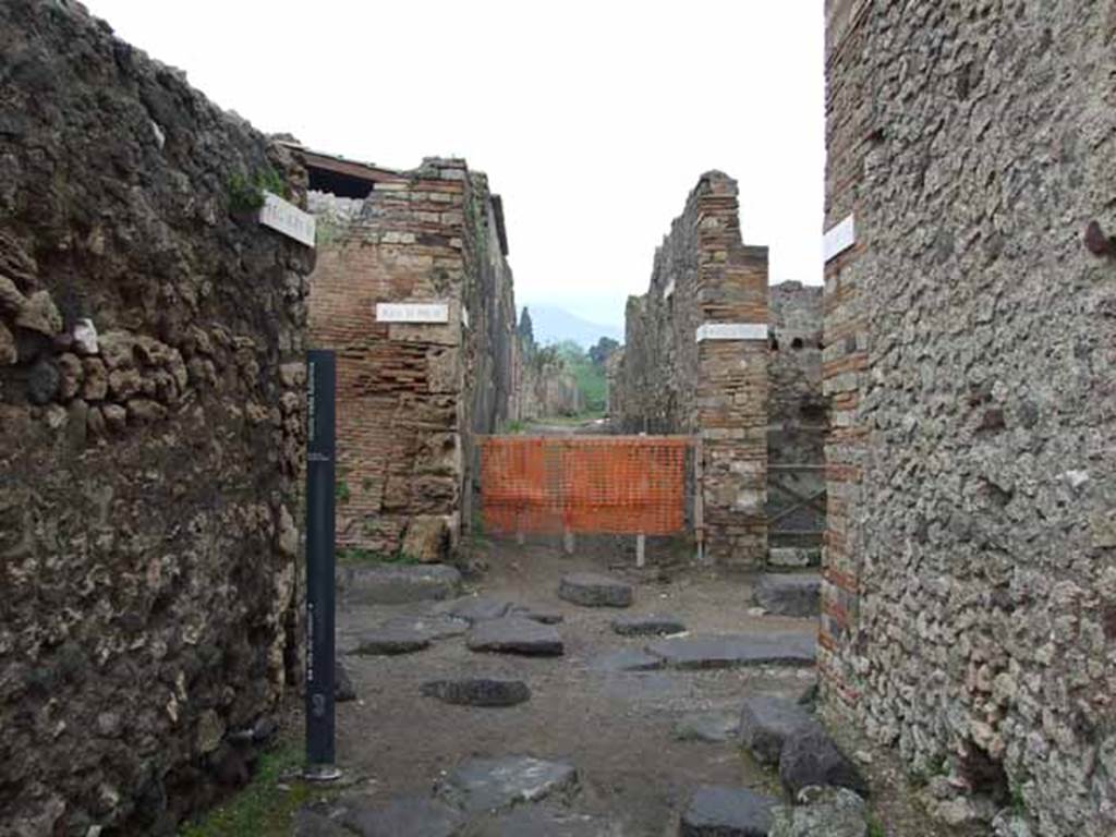 Vicolo della Fullonica. May 2010. Looking north to junction with Vicolo di Mercurio, and north between VI.5 and VI.7.