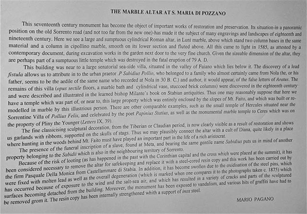 Stabiae Temple of Diana. April 2005. Description card in the Villa San Marco by Mario Pagano, about the decorated marble altar.
It was found in 1585 during excavation works in the garden next to the church of S. Maria di Pozzano. 
It may have been part of a small temple, probably to Diana, which was destroyed by the eruption of 79AD.
Photo courtesy of Michael Binns.
