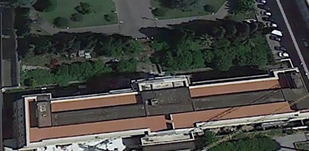 Pompeii, Tombe del Fondo Prelatura. 2012 photo � courtesy of Google Earth.

�In 1952 about 60 m east of the Fondo Pacifico five more Tombs were discovered during construction work, of which however only two could be investigated, and in turn only one preserved. 
See P. Ciprotti, Notizie degli Scavi di Antichit�, 1961, pp. 189-200.
According to Kockel, the graves lie on both sides of the once again paved road to Nuceria. Both buildings were two storeys.
In the very brief investigations due to the construction work, however, only small remnants of the upper storeys were found. 
The Western Tomb has a massive base with small niches for the usual steles in the Herm form.
The pedestal of the eastern tomb with three-quarter columns at the corners and a passage used for burials is to a large extent the type of Porta di Nocera north-east tomb 34aEN. 
The owners (Melissaei, Audia) are known only for the first Tomb. 
Three well-preserved travertine statues (Togatus and Pudicitia variations) belong to one of these structures.
The mausoleums and statues were created in late Republican to mid Augustan period.
See Kockel V. Funde und Forschungen in den Vesuvstadten 1: Arch�ologischer Anzeiger, Heft 3. 1985, p. 564.�

�Bereits 1952 wurden bei Bauarbeiten ca. 60 m �stlich des Fondo Pacifico f�nf weitere
Grabbauten entdeckt, von denen allerdings nur zwei genauer untersucht und wiederum nur einer konserviert werden konnte. 
Siehe P. Ciprotti, Notizie degli Scavi di Antichit�, 1961, pp. 189-200.
Nach Kockel, die Gr�ber liegen auf beiden Seiten der hier wieder gepflasterten Stra�e nach Nuceria. Beide Bauten waren zweigeschossig. 
Bei den durch die Bauarbeiten bedingten sehr fl�chtigen Untersuchungen wurden allerdings nur geringe Reste der Obergeschosse gefunden. 
Das westliche Grab besitzt einen massiven Sockel mit kleinen Nischen f�r die �blichen Stelen in Hermenform; der Sockel des �stlichen wiederholt mit Dreiviertels�ulen an den Ecken und einem f�r Bestattungen genutzten Durchgang weitgehend den Typus von Porta di Nocera Nordost 34a (s.o.). 
Nur f�r das erste Grab sind die Besitzer bekannt (Melissaei, Audia). 
Drei gut erhaltene Statuen aus Travertin (Togatus und Pudicitia-Variationen) geh�ren zu einem dieser Bauten. 
Die Mausoleen und die Statuen sind in sp�trepublikanischer bis mittelaugusteischer Zeit entstanden.�
Siehe Kockel V. Funde und Forschungen in den Vesuvstadten 1: Arch�ologischer Anzeiger, Heft 3. 1985, p. 564.