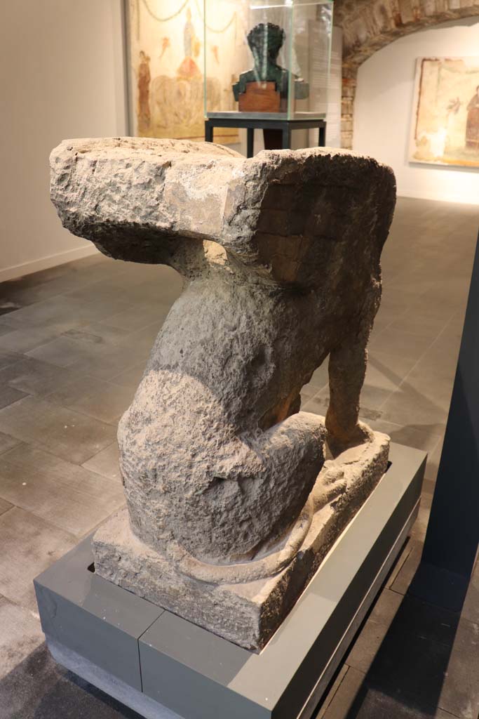 From Farm of Fondo Prisco, Boscoreale. February 2021. 
Rear of tufa Sphynx-shaped tombstone re-used as a kerbstone, on display in Pompeii Antiquarium.
Photo courtesy of Fabien Bi�vre-Perrin (CC BY-NC-SA).
