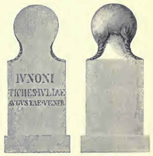 HGW16 Pompeii. 1907 drawing of marble cippus found to the west of the monument on 14th November 1812. It has the Latin inscription.

IVNONI
TYCHES IVLIAE
AVGVSTAE
VENER.

According to Epigraphik-Datenbank Clauss/Slaby (See www.manfredclauss.de) this read:

Iunoni
Tyches Iuliae
Augustae Vener(es)       [CIL X 1023]

Mau translates this as: �To the Genius of Tyche, slave of Julia Augusta, of the cult of Venus�.
See Mau, A., 1907, translated by Kelsey F. W. Pompeii: Its Life and Art. New York: Macmillan. (p. 418, Fig. 240).
