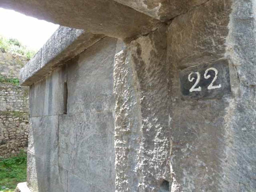 HGW22 Pompeii. May 2010. South side of base of tomb.
