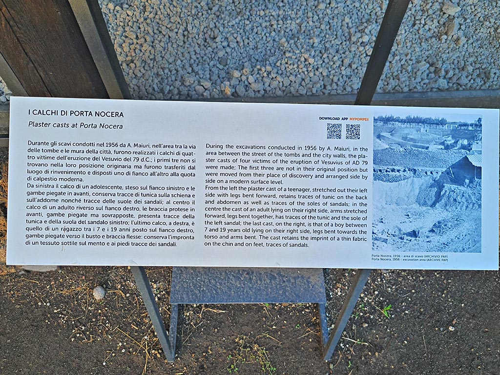 North-west side of Via delle Tombe. October 2024. Information card. Photo courtesy of Giuseppe Ciaramella.