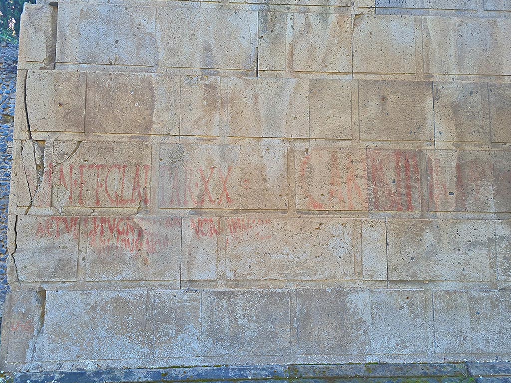 Pompeii Porta Nocera. October 2024. Tomb 17OS. Detail of graffiti on north side. Photo courtesy of Giuseppe Ciaramella.