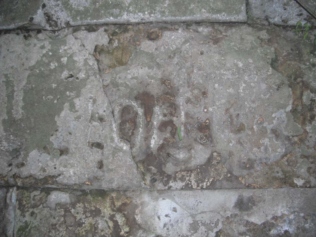 Tombs PSPN Pompeii. May 2011. Inscription to Loia. Photo courtesy of Ivo van der Graaff.
According to Epigraphik-Datenbank Clauss/Slaby (See www.manfredclauss.de) this reads
LOIA                [CIL IV, 2497 (p 466) = CIL X, 8354 = AE 2004, +00398]

Virginia Campbell records this as
LOIIA
Loiia or Loea or Lolla or Lol(l)ia
See Campbell V., 2015. The tombs of Pompeii: organization, space, and society. New York-London: Routledge, p. 336.

