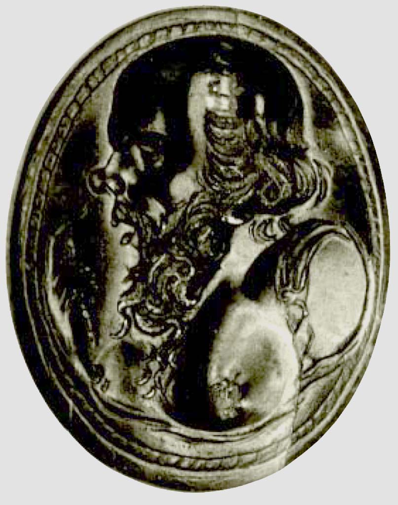 Villa Rustica, Casa di Miri. Villa del Filosofo. Foto della corniola che impreziosiva l�anello rinvenuto nella villa cui ha dato il nome.
Riportiamo la descrizione del Pannuti: �Il personaggio, probabilmente un filosofo o un oratore � di profilo verso sinistra; il busto � nudo ma con un po� di panneggi sulla spalla sinistra
e sotto il petto. L�indice destro � levato in alto; le altre dita stringono forse uno stilo, cornice ovale riempita a tratteggio, colore arancio vivo, anello in oro vecchio, fulgido in controluce.
Lavoro di buon livello tecnico, modellato plastico�.

Photo of the carnelian that embellished the ring found in the villa to which it gave its name.
Pannuti's describes: "The person, probably a philosopher or an orator, is in profile towards the left; the bust is naked but with a little drapery on the left shoulder and under the chest. The right index finger is raised; the other fingers are perhaps holding a stylus, oval frame filled in with hatching, bright orange colour, ring in old gold, shining against the light.
Work of good technical level, modelled in relief".

See Di Massa G., Il Territorio di Gragnano nell�antichit� e l�Ager Stabianus, p. 40.
