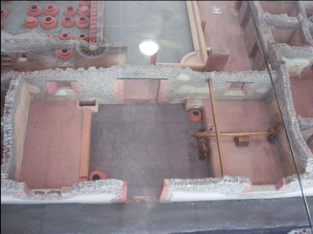 Villa della Pisanella, Boscoreale. May 2018. Torcularium P looking south with west area “a” with wine press on the right and east area “b” on the left.
Model of villa in Boscoreale Antiquarium.
