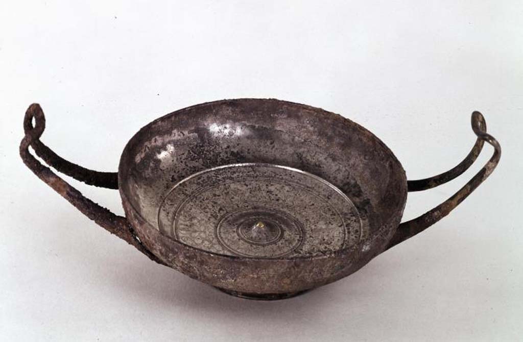 Villa della Pisanella, Boscoreale? Stemless silver cup engraved with floral designs and with a gold pin in the centre.
The cup was purchased by the museum from V. Vitalini in 1897.
The bronze Scylla dish (inventory number BM 1897,0726.7) found in Villa Pisanella was also acquired from V. Vitalini in 1897.
Both items are shown simply on the BM website as Boscoreale. Is this silver cup also from Villa Pisanella?
Photo © Trustees of the British Museum, inventory number BM 1897,0726.1. Use subject to CC BY-NC-SA 4.0.