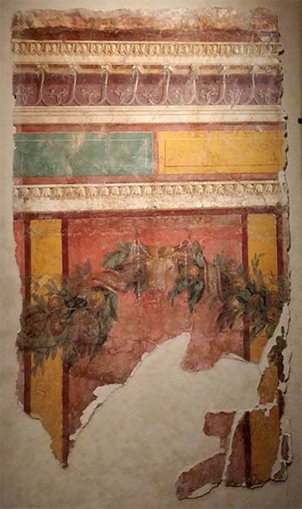 Villa of P. Fannius Synistor at Boscoreale. Room L, tablinum, east wall. 
Panel with garland, bucranium, red panels with yellow dividing bars, yellow and green blocks with cornice above. 
Now in the Mus�e de Picardie, Amiens, France.
See http://amiens.fr/votre_vie_quotidienne/vie_culturelle/musees_damiens/musee_de_picardie.html
