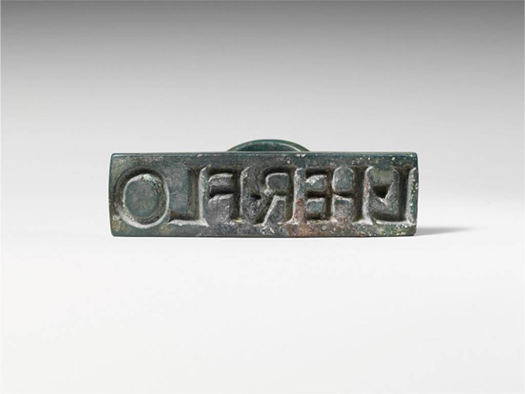 Villa of P. Fannius Synistor at Boscoreale. Bronze seal and stamp engraved L. HER. FLO
In the later times the villa was perhaps in the ownership of L. Herius Florus or L. Herennius Florus, whose seal was found in the house.
According to De Petra, the seal was discovered on the 15th January 1901 and gives the name L. Herio Floro.
See Rendiconto delle Tornate e dei Lavori dell'accademia di Archeologia, Lettere e Belle Arti, Vol. XV, 1901, p. 40. See at B.I.A.S.A
According to Della Corte, the seal gives the name of the possessor of the villa in the last days of Pompeii as L. Herius Florus.
See Della Corte, M., 1965. Case ed Abitanti di Pompei. Napoli: Fausto Fiorentino, no. 968, p. 430.
According to the Metropolitan Museum New York, the stamp was presumably his property and likely served as the official seal of the household used to mark provisions.
Photo © The Metropolitan Museum of Art, Fletcher Fund 1930.
According to Sambon, it shows Lucius Herennius Florus, the name that the Metropolitan Museum also uses.
See Sambon, A., 1903. Les fresques de Boscoreale, Paris-Naples, p. 2.