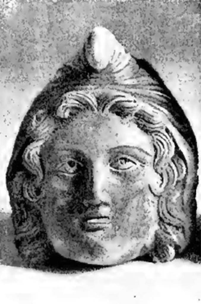 Villa of T. Siminius Stephanus, fondo Barbatelli. November 1899.  Front view of the bust of Paris wearing a Phrygian cap. On the 24th day, at a depth of 3.80m, found between the ash layers was a bronze protome of Paris, very well shaped, with Phrygian cap, ringed hair and silver eyes, whose eye-ball was made of glass paste: height  80mm. See Notizie degli Scavi di Antichit�, 1899, p439, fig 1b.