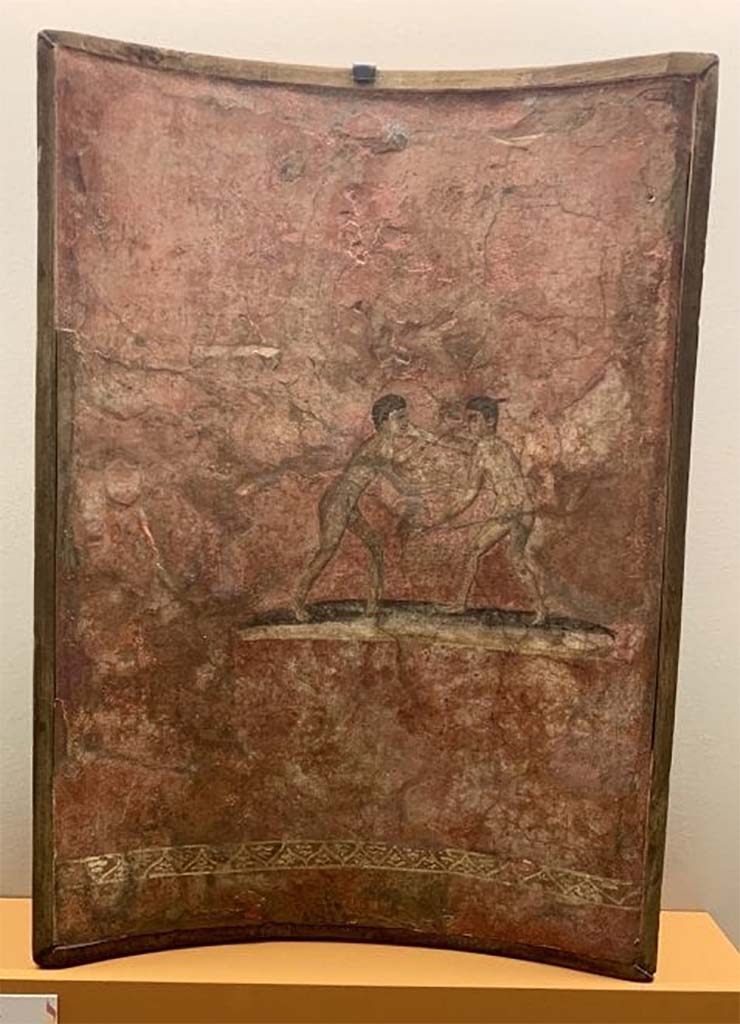 Scafati. Villa Rustica in Fondo Matrone, Contrada Spinelli. Caldarium "no.6". Curved panel with a pair of naked wrestlers. 
Now in Naples Archaeological Museum. Inventory number 134059.
Bianca Maiuri describes the painting and attributes it to this villa.
See Maiuri, B., 1950. Ludi Ginnico - Atletici a Pompei: in Pompeiana, Raccolta di Studi per il secondo centenario degli scavi di Pompei. Napoli: Gaetano Macchiaroli, p. 180, no. 22 and note 3.

