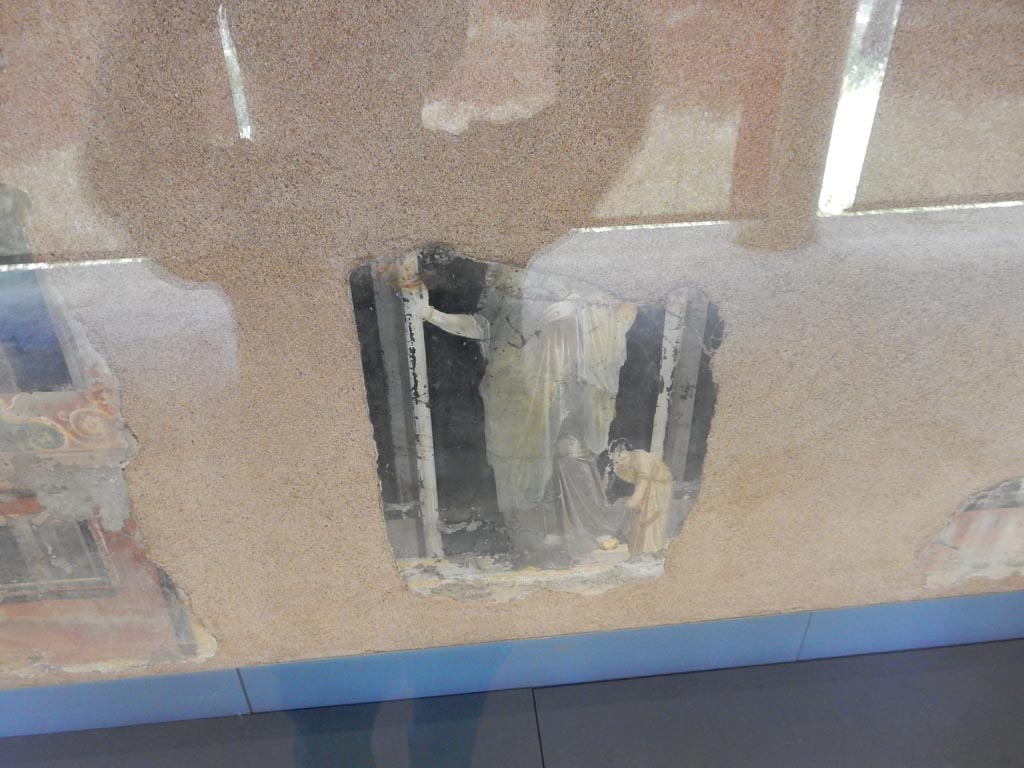 Complesso dei triclini in località Moregine a Pompei. May 2018. Triclinium B, north wall.
Painting of a goddess (Juno?) with handmaiden on display in the Pompeii Palaestra.
According to Nappo this may be Helen as part of the myth of Helen and the twin heroes but the absence of the head makes it hypothetical, justified only by the iconography that refers to this myth .
See Nappo, S. C., 2001. La decorazione parietale dell'hospitium dei Sulpici in località Murecine a Pompei MEFR Antiquité, tome 113, n°2. 2001, pp. 882.
Photo courtesy of Buzz Ferebee.