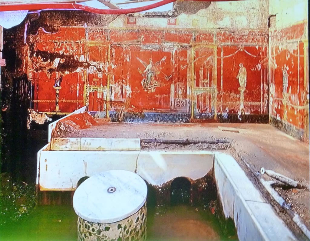 Complesso dei triclini in località Moregine a Pompei. 1959 excavation photograph on display in Pompeii Palaestra September 2015.
Triclinium C. West wall in situ. Note the water that was a problem during excavation.