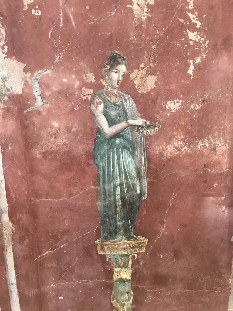 Complesso dei triclini in località Moregine a Pompei. April 2019. Triclinium C, north wall green robed female perfumer or offer-bearer.
Photo courtesy of Rick Bauer.