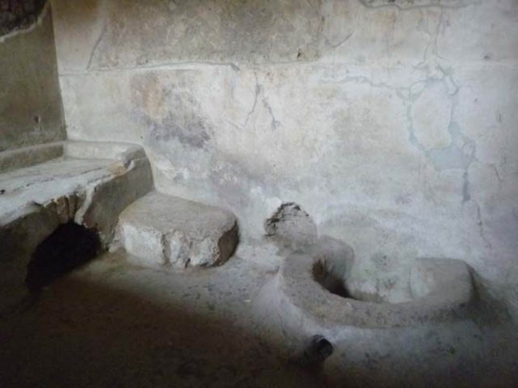 Oplontis, May 2011. Room 7, the kitchen. Looking towards the hearth in the north-east corner. Against the east wall is a vat/tank for the collection of waste water. Photo courtesy of Michael Binns.