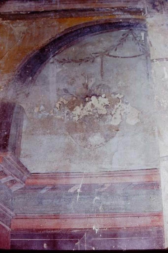 Oplontis Villa of Poppea, 1972 (or 1973). Room 14, triclinium, detail from upper side panel of north wall.
Photo by Stanley A. Jashemski. 
Source: The Wilhelmina and Stanley A. Jashemski archive in the University of Maryland Library, Special Collections (See collection page) and made available under the Creative Commons Attribution-Non Commercial License v.4. See Licence and use details.
J72f0268
