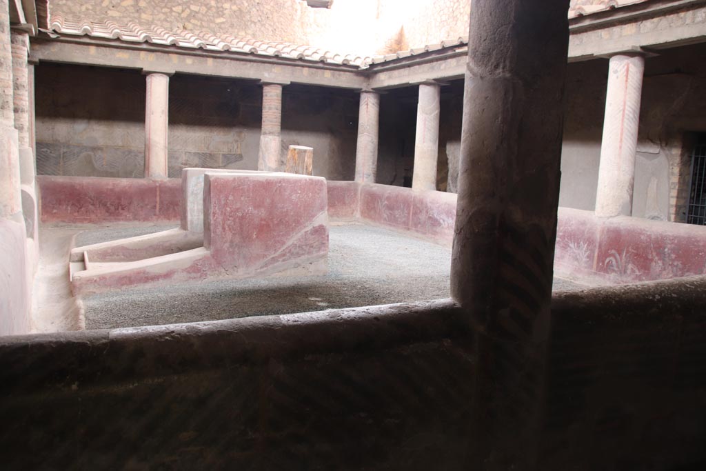 Oplontis Villa of Poppea, May 2024. Room 32, looking north across rustic courtyard. Photo courtesy of Klaus Heese.