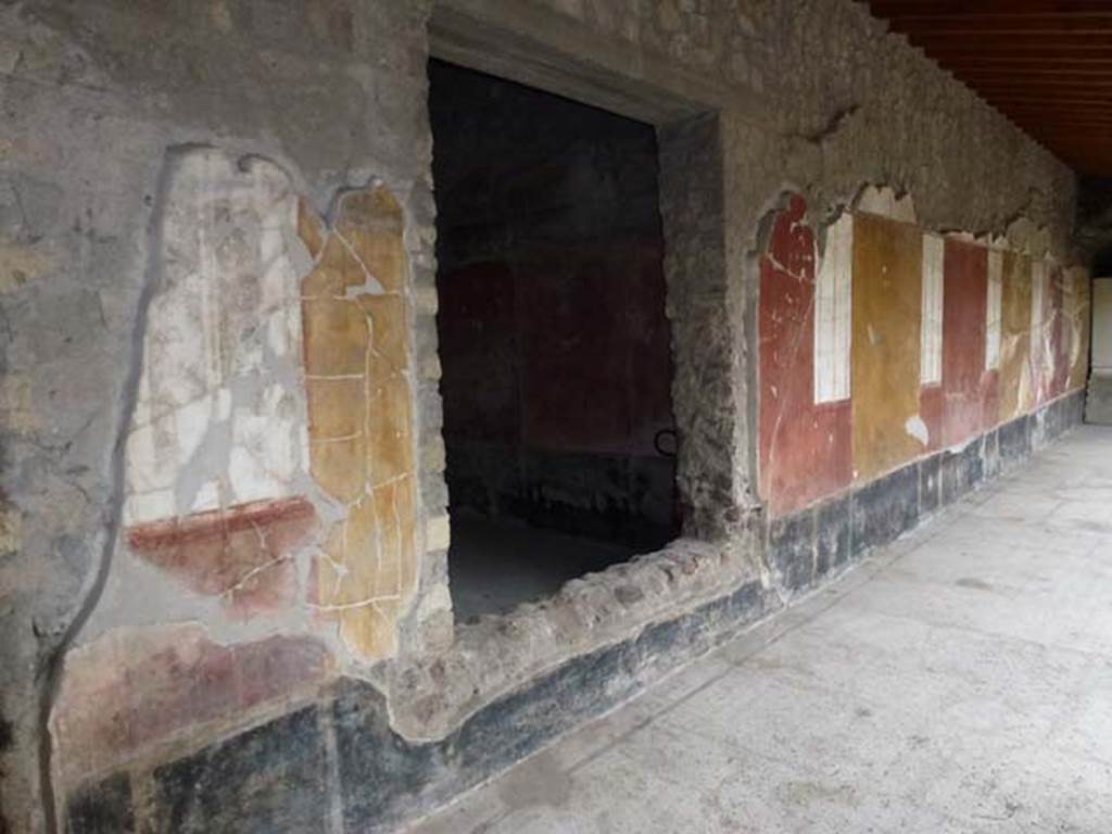 Oplontis, September 2011. Portico 33, looking west along wall of portico, and window into room 17. Photo courtesy of Michael Binns