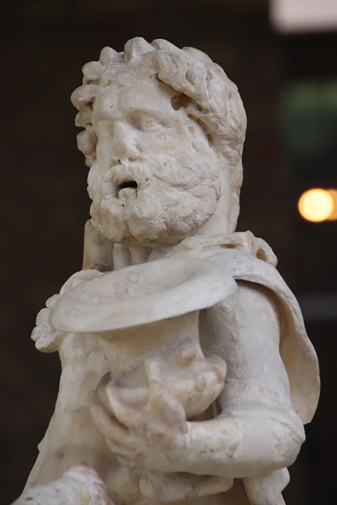 Villa of Poppaea, Oplontis, October 2023. 
Detail of statuette of Centaur holding a club and a crater, on display in Room 21. Photo courtesy of Klaus Heese. 
