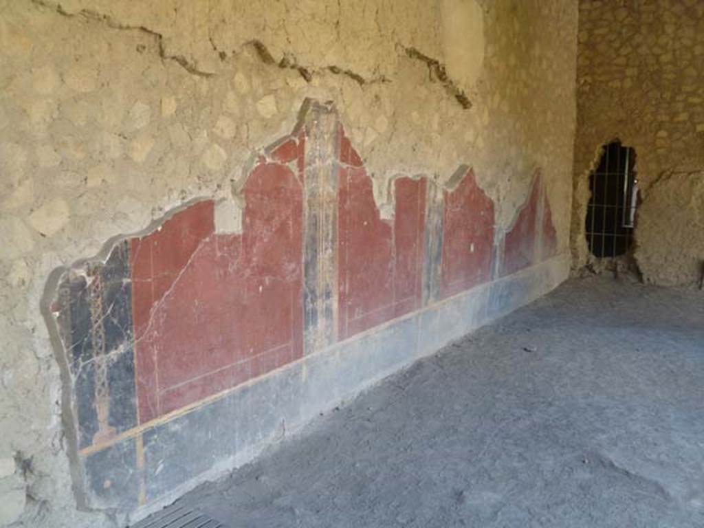 Oplontis, May 2011. Portico 40, detail of painted decoration, in north-west corner..
Photo courtesy of Michael Binns.