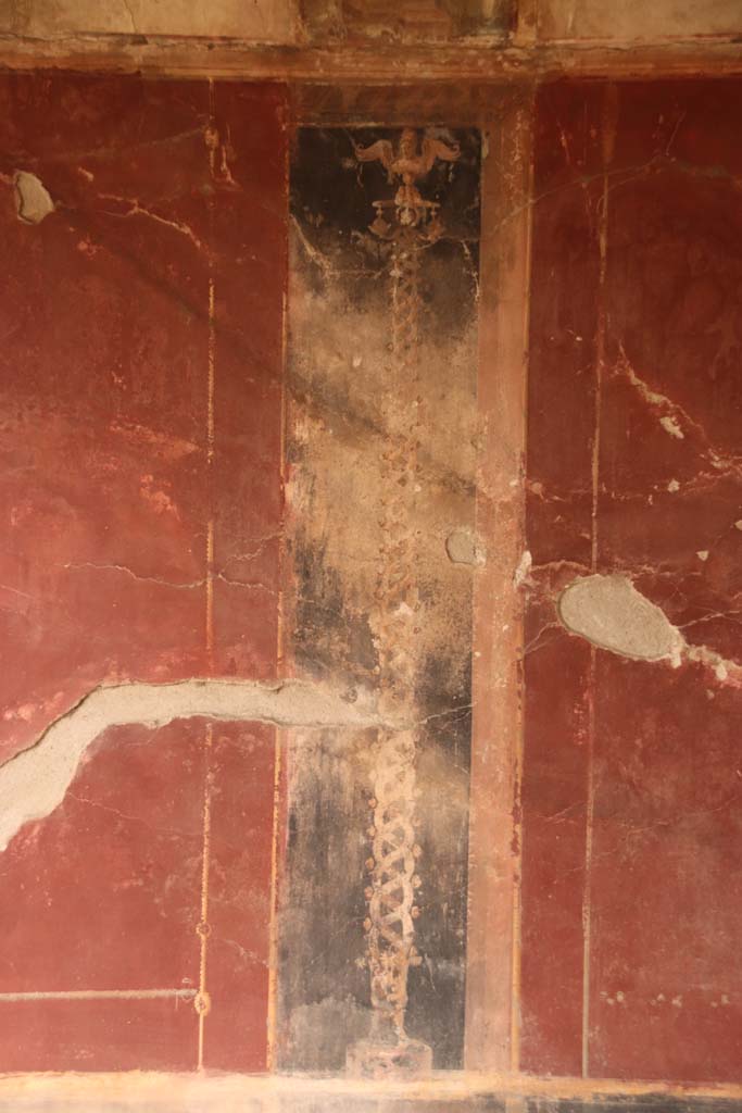 Oplontis Villa of Poppea, October 2020.
Area 40, painted golden twisted candelabra set in a black panel from north wall in north-east corner.
Photo courtesy of Klaus Heese.