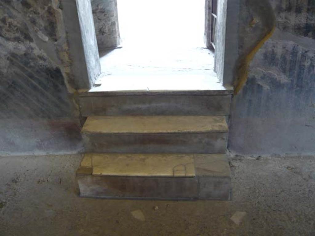 Oplontis, May 2010. Steps in corridor 45, leading to the latrine area, and rooms beyond. Photo courtesy of Buzz Ferebee. 
