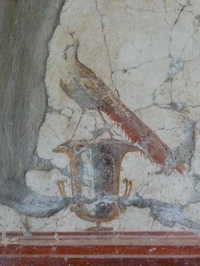 Oplontis, May 2011. Room 81, detail of painted peacock on vase, from south wall..
Photo courtesy of Michael Binns.