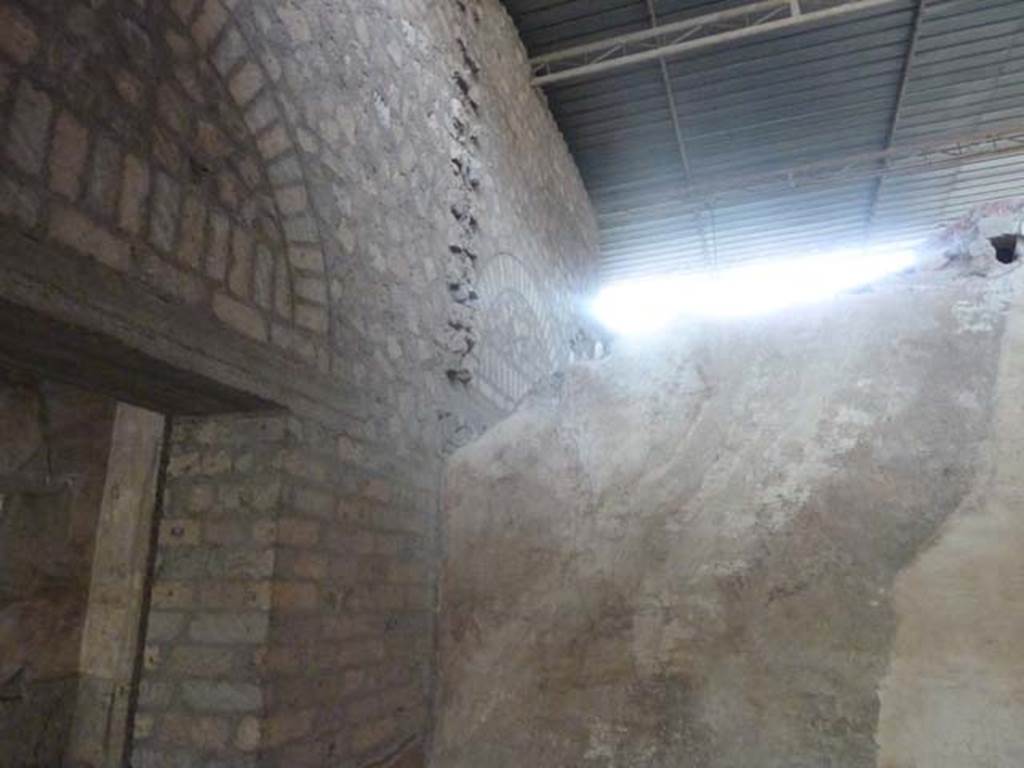 Oplontis, September 2015. Room 88, looking towards south-west corner, the reconstructed upper south wall of rooms 88 and 87 and the original west wall, on right