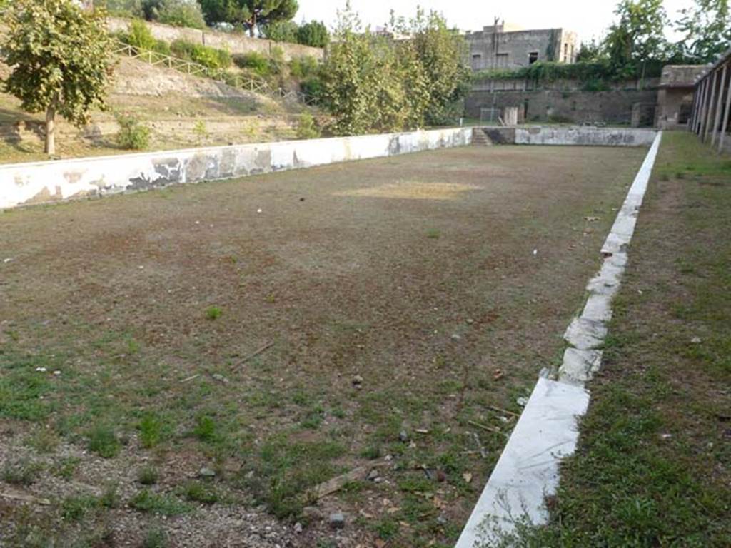 Oplontis, September 2011. Looking south along swimming pool, from north end of west portico. Photo courtesy of Michael Binns.
