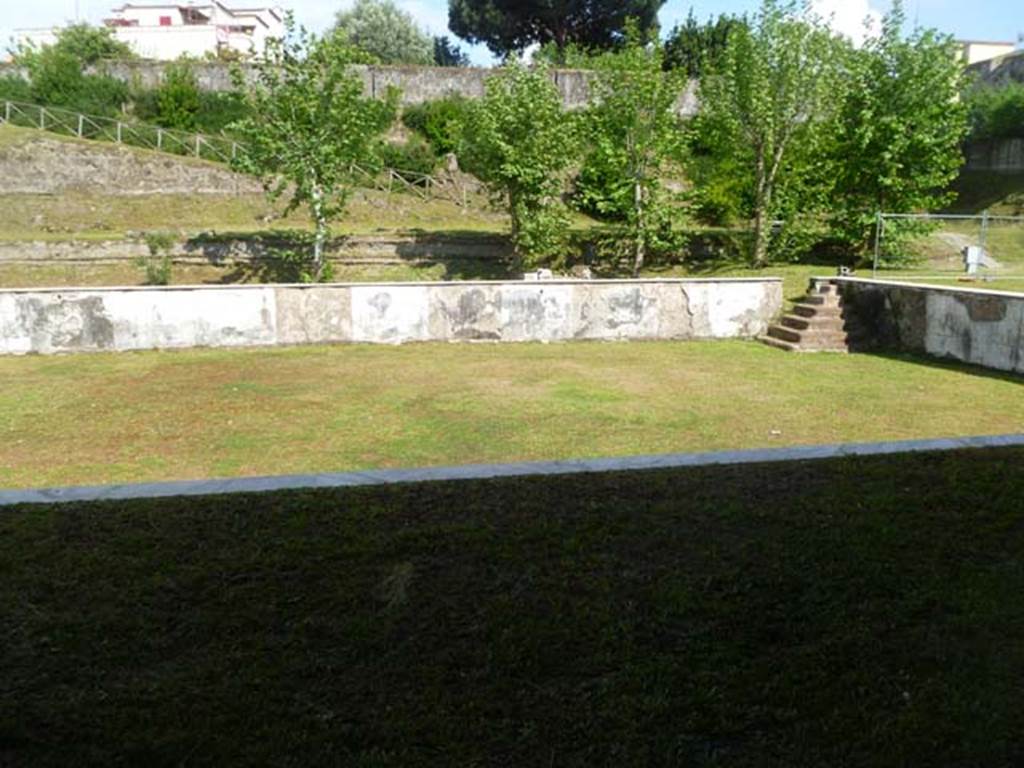 Oplontis, May 2011. Looking east across swimming pool, from area 60,the west portico. Photo courtesy of Michael Binns.
