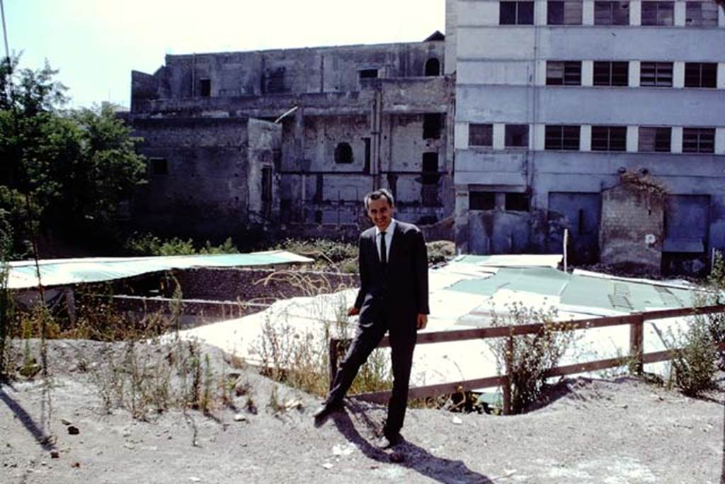 Oplontis, 1968. Dr. Carlo Giordano posing for a photo above the largely still-to-be excavated villa, looking south. Photo by Stanley A. Jashemski.
Source: The Wilhelmina and Stanley A. Jashemski archive in the University of Maryland Library, Special Collections (See collection page) and made available under the Creative Commons Attribution-Non Commercial License v.4. See Licence and use details. J68f1504