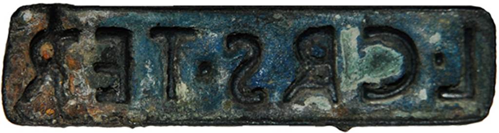 Oplontis, Villa of Lucius Crassius Tertius. Bronze seal of Lucius Crassius Tertius, bottom view.