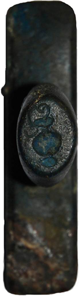 Oplontis, Villa of Lucius Crassius Tertius. Bronze seal of Lucius Crassius Tertius, top view. The top stamp appears to be a vase or similar container for liquid.