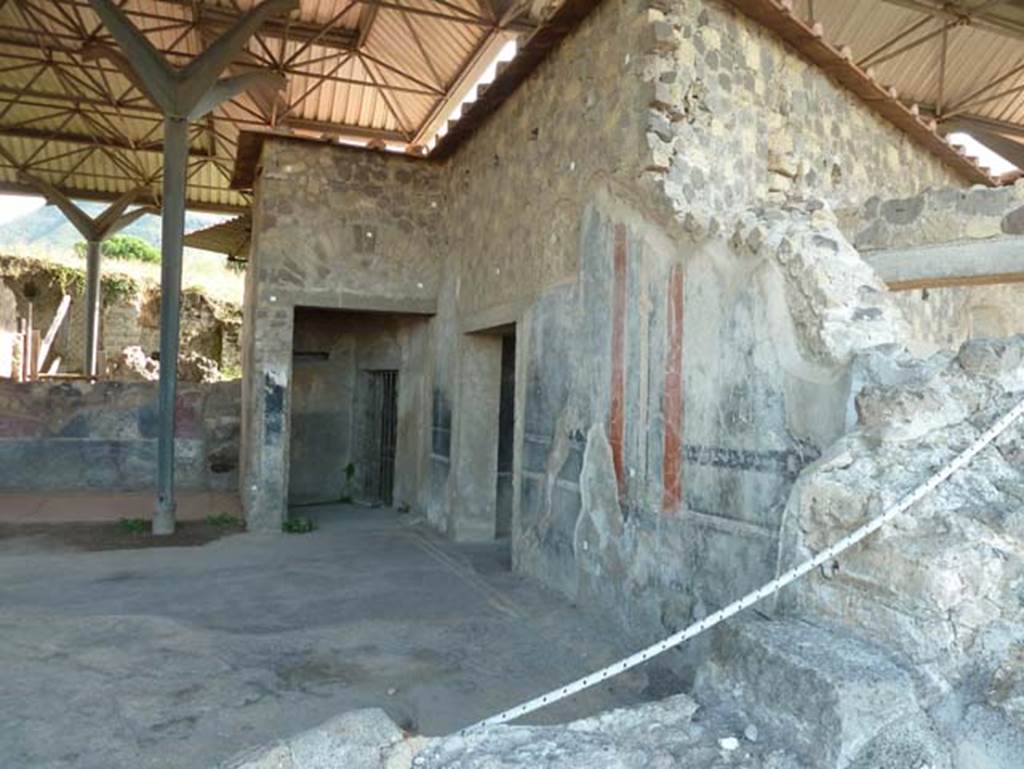 Stabiae, Secondo Complesso, September 2015. 
Room 14, looking through remains of window towards the west wall with two doorways. 
The furthest doorway is in room 20, leading into room 19, the nearest doorway leading into room 15. 
