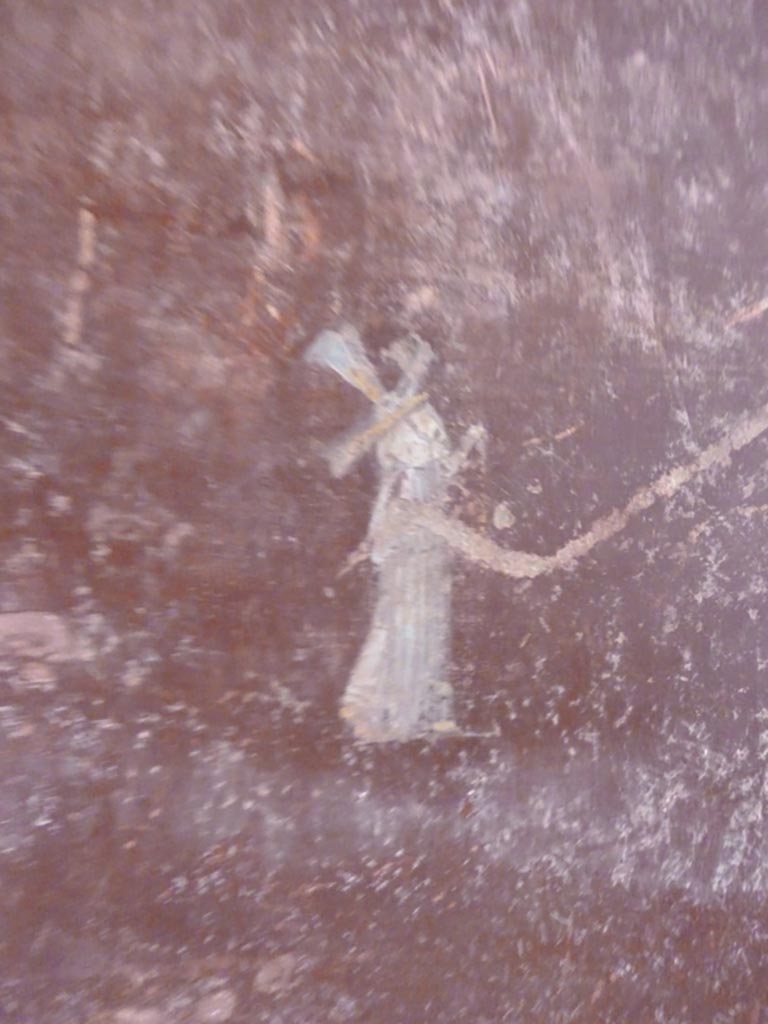 Stabiae, Villa Arianna, September 2015. W.28, painted figure from centre of panel on west wall. 