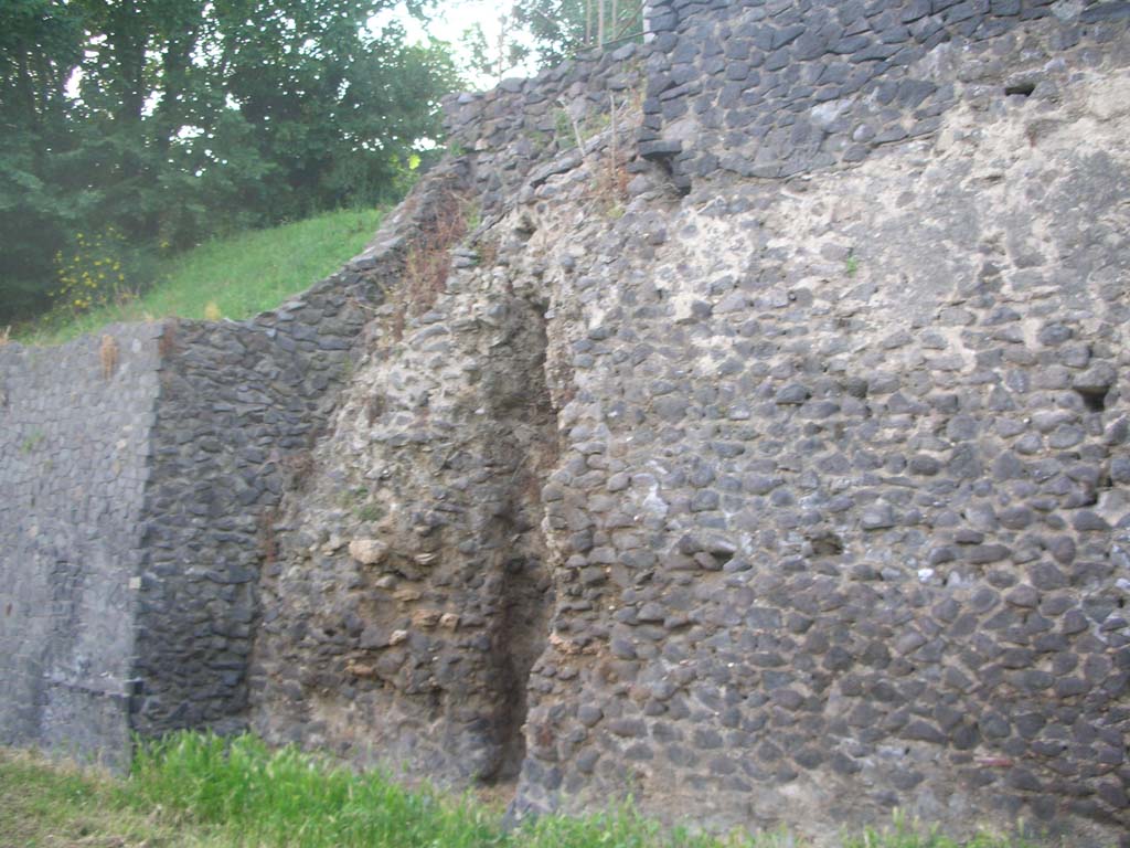 City Walls on south side, Pompeii. May 2010. 
Looking west towards detail from city walls near Tower V. Photo courtesy of Ivo van der Graaff.
